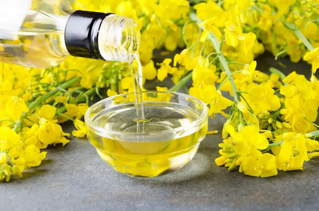 Canola oil bottle with canola blossoms